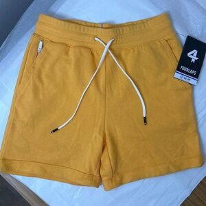 NWT FOURLAPS RUSH SHORT IN MANGO ***NOTES
